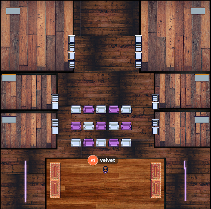 Gather.Town top-down interface view. Velvet likes wood flooring so its everywhere -- in the big and small rooms on the sides, the stage at the bottom. The purple and white audience chairs help to offset this much dark-stained wood