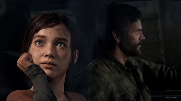The Last of Us (Naughty Dog) Ellie looks out the truck window while Joel drives; both are covered in the grime of surviving a post-apocalyptic world