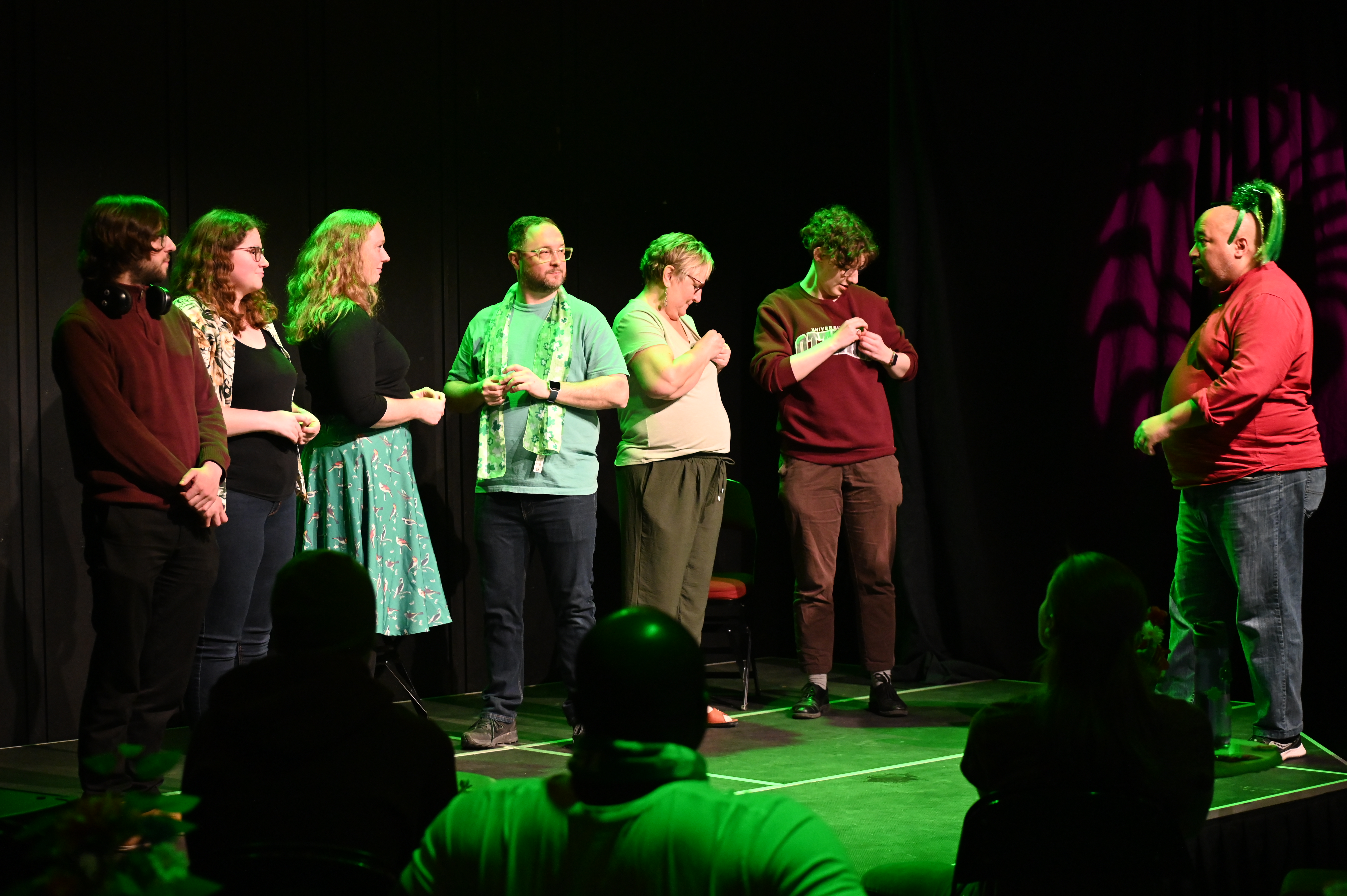 A group of six performers prepare for competition in the Ottawa WordPlayFight demo. Photo: Austin Vee @safety_captain